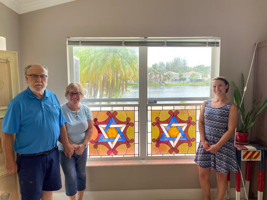Bedford Artist Repairs and Restores 100 year old windows from Downtown Bedford